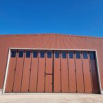 Portone a libro con guida a pavimento 6+6 con porta U.S.