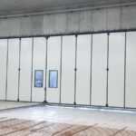 Portone a libro con guida a pavimento 8+8