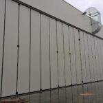 Portoni a libro con guida a pavimento